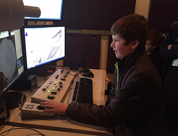 students on the machine